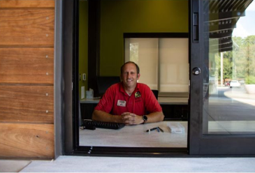 Birmingham Zoo Ticket Booth with guest services employee greeting you and smiling